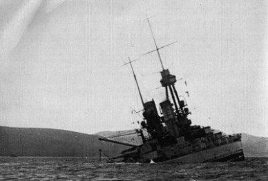 Iconic image of SMS Baden sinking during the scuttling of the German Fleet.